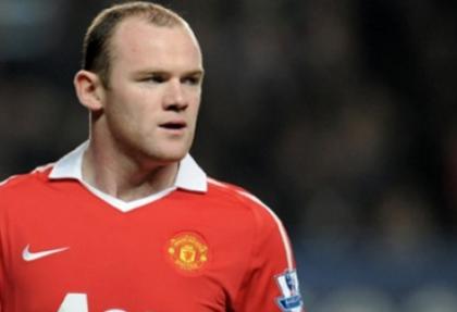 Rooney Manchester United'da kalıyor